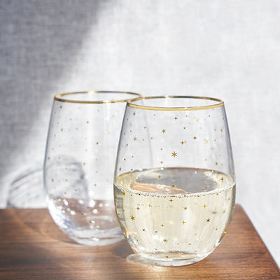 FESTIVE HOLIDAY GLASSWARE - Toast the holidays with this brilliant set of sparkling stemless wine glasses. Perfect for entertaining or for a quiet party of two, this beautiful glassware will add some twinkle to your wine.