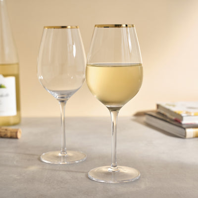 GOLD TRIM STEMWARE - Made from elegant clear glass, these 14 oz. stemmed wine glasses have an electroplated gold rim to add a subtle sparkle to your home bar, kitchen, or bar cart. Perfect for Pinot Noir, Rosé, or Pinot Gris.