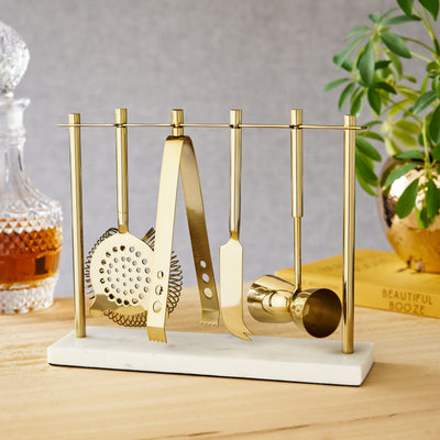EVERYTHING YOU NEED IN A COCKTAIL TOOL SET - Complete with a Hawthorne strainer, citrus knife, ice tongs, double jigger, and marble stand, this stainless steel bar tool set includes all the barware essentials and bar tool basics.
