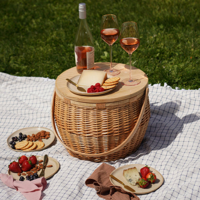 INSULATED PICNIC BASKET WITH LID AND HANDLE: This outdoor picnic basket is perfect for al fresco dining. Complete with an insulated lining that zips shut and protects the basket against spills, this willow wicker picnic basket elevates your beach day or lake party.