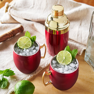 FESTIVE MULE MUG AND COCKTAIL SHAKER - This festive holiday barware set includes 2 16 oz. Moscow Mule mugs and a 16 oz. cocktail shaker with a gorgeous red and gold finish! This stylish 2-tone bar set is perfect for holiday entertaining.