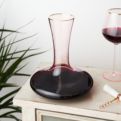 PINK TINTED WINE DECANTER - Smooth curves and a rosy pink hue give this decanter a vintage barware look meets contemporary silhouettes. Bring flair to your wine service and bring the best out of your finest vintages. Suitable for red and white wine.