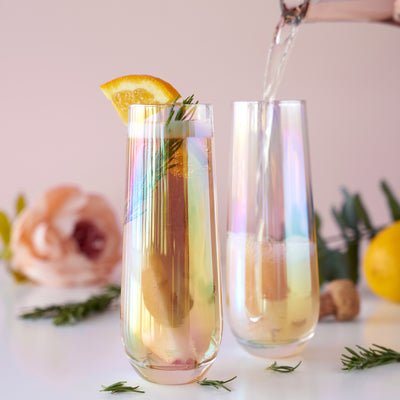 LUSTROUS RAINBOW GLASSWARE - Make every happy hour special with this brilliant set of sparkling stemless champagne glasses. Perfect for entertaining or for a quiet party of two, this beautiful glassware will add some shine to your sparkling wine.