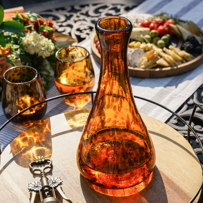 AMBER SPECKLED WINE DECANTER - A modern silhouette and a brown speckled glass give this red wine decanter a vintage barware look meets contemporary style. Bring flair to your wine service with this wine carafe. Suitable for red and white wine.
