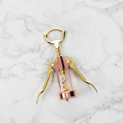 WINGED WINE BOTTLE OPENER – This copper and gold winged corkscrew with self-centering worm and built-in bottle opener makes wine service a breeze. Never struggle with unwieldy wine keys again. Perfect for dinner parties or cocktail hour!