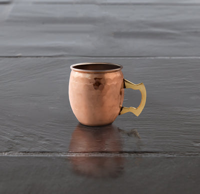 TWO MINI MOSCOW MULE MUGS - This set of two miniature Moscow Mule-style shooters take the shot glass to a whole new level. Add these cute, classy bar accessories to your glassware collection for a fun conversation piece. Holds 2 oz.