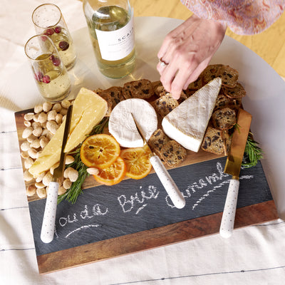 ELEGANT ACACIA WOOD CHEESE BOARD - Upgrade your hors d'oeuvres presentation with this rectangular acacia wood and slate cheese board and chalk set. Designed with a slate inset for labeling appetizers, this service set brings extra class to your hosting.