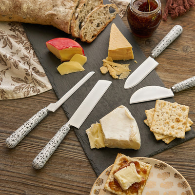 BEAUTIFUL CERAMIC TILE HANDLES WITH INTRICATE PATTERN - This set of four cheese knives capture the welcoming white patterned tile aesthetic. At once trendy but classic, this knife set fits in perfectly with a range of styles, from modern farmhouse to mid century modern and contemporary decor.