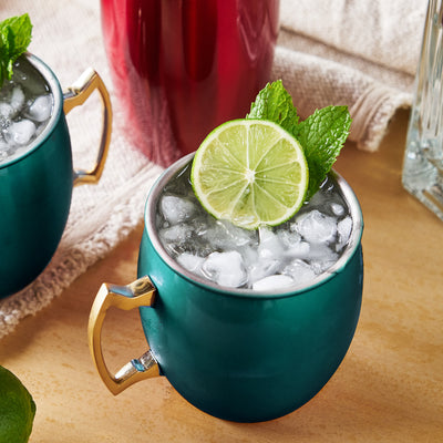 CLASSIC DESIGN WITH A FESTIVE TWIST - Enjoy your Moscow Mule in a mug that combines the iconic copper mug silhouette with a new, festive look. The metallic green finish and classic gold handle bring holiday cheer to any cocktail. 