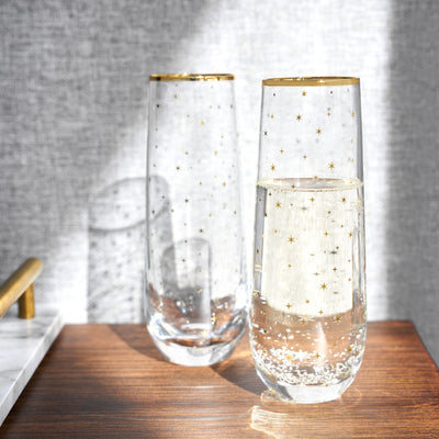 FESTIVE HOLIDAY GLASSWARE - Toast the holidays with this brilliant set of sparkling stemless champagne flutes. Perfect for entertaining or for a quiet party of two, this beautiful glassware will add some twinkle to your Prosecco.