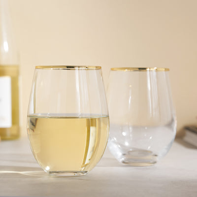 SET OF 2 GOLD RIMMED WINE GLASSES - These gilded wine glasses bring a touch of gold to your favorite vintages. Skip boring clear wine glasses and add some sparkle to your table with this elegant gilded glassware at your next party.